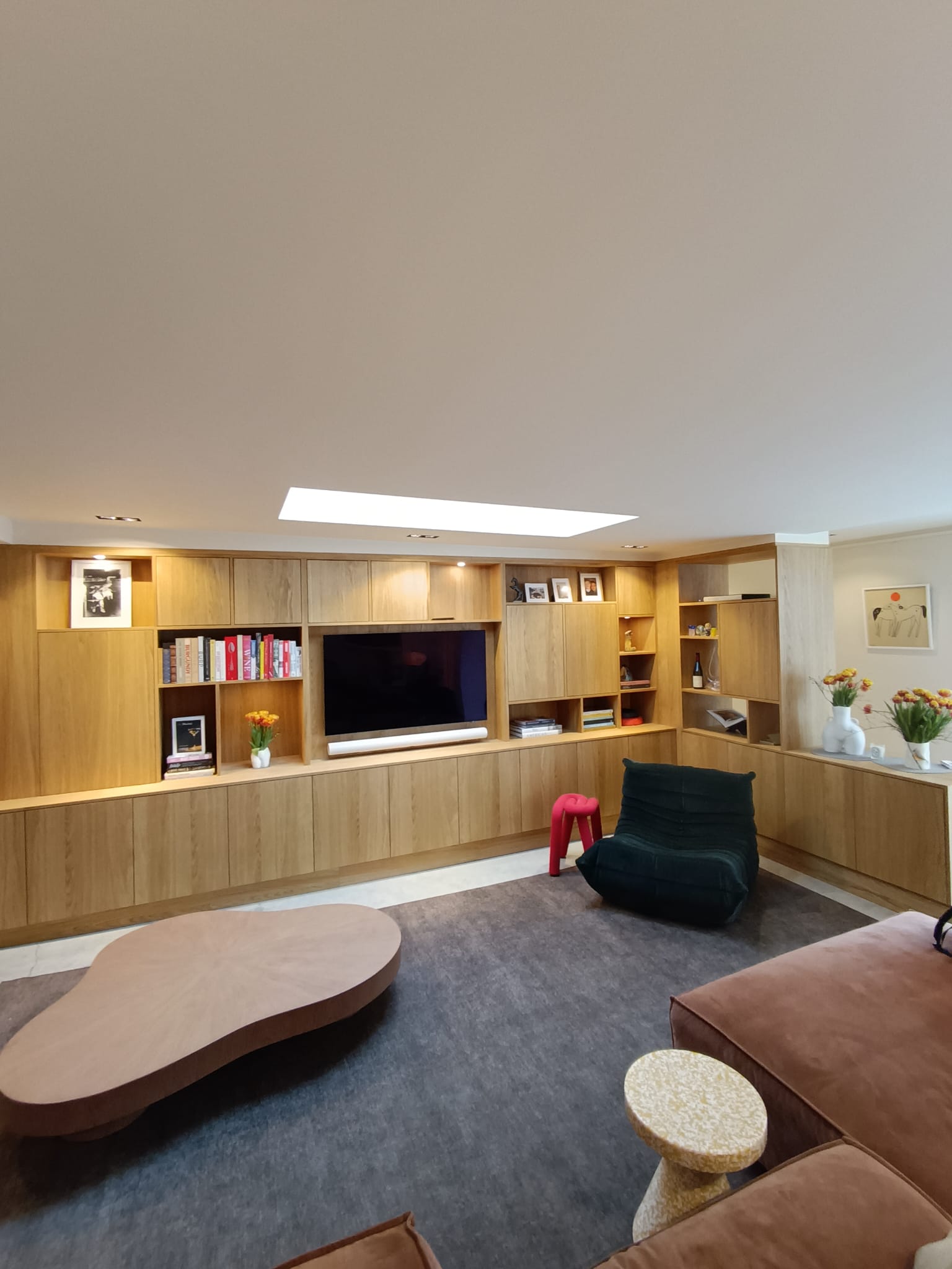 Custom oak TV and library cabinet with integrated TV unit